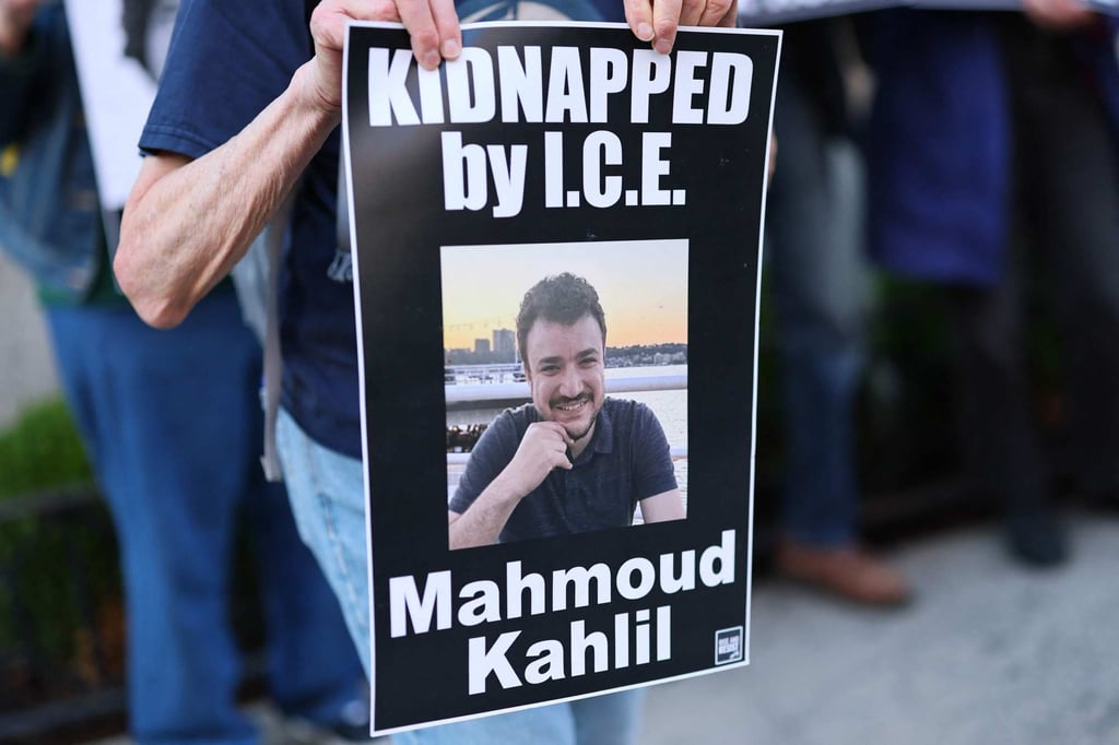 A protester holds a photo of Columbia University student Mahmoud Khalil in New York on Thursday. Photo: AFP