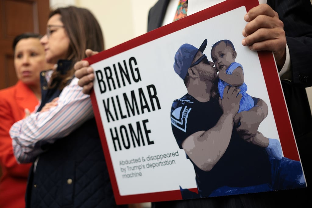 A member of the Congressional Hispanic Caucus holds a picture of Kilmar Abrego Garcia, who was deported from the US to El Salvador. Photo: TNS