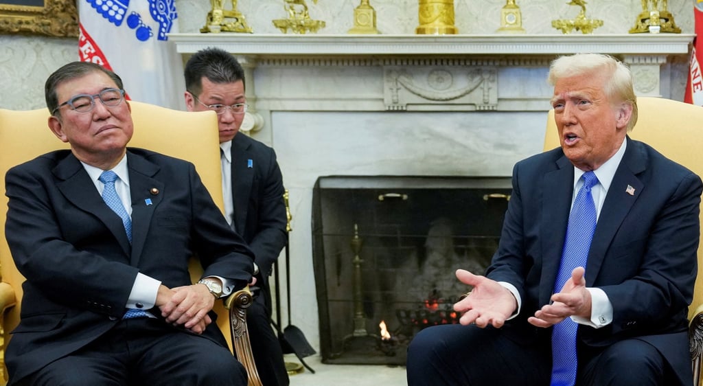 US President Donald Trump (right) meets Japan’s Prime Minister Shigeru Ishiba at the White House on February 7. Photo: Reuters