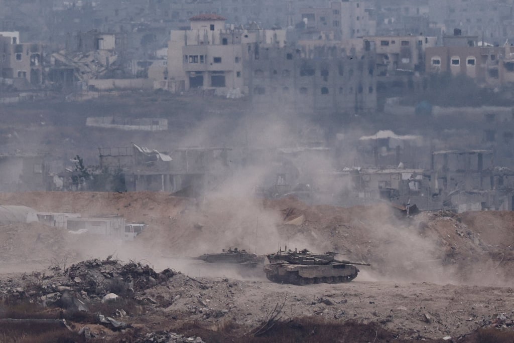 Israeli tanks manoeuvre amid ruins in North Gaza. Photo: Reuters