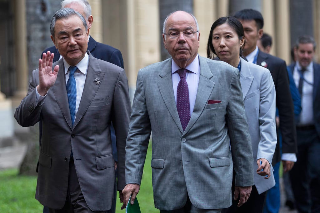 Chinese Foreign Minister Wang Yi (left) and his Brazilian counterpart Mauro Vieira arrive for a Brics meeting in Rio de Janeiro on Tuesday. Photo: AP