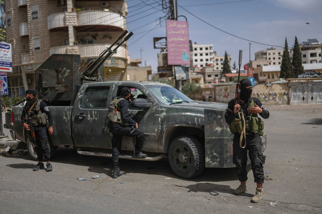 Members of Syria’s security forces deploy in the town of Sahnaya, south of Damascus, following sectarian clashes. Photo: AP
