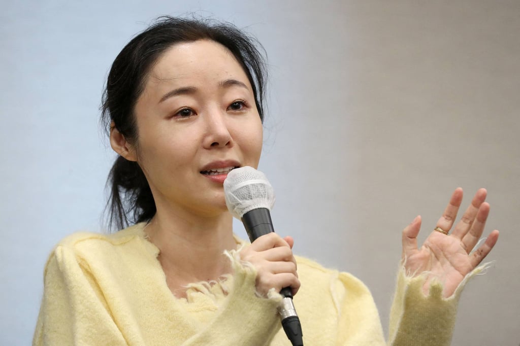 Min Hee-jin, the creative force behind K-pop group NewJeans, during a press conference in May 2024. Photo: AFP