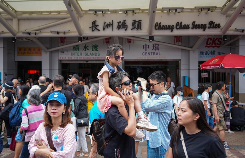 People wait for the ferry at Cheung Chau pier. Photo: Eugene Lee