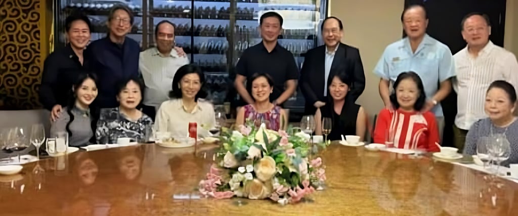 A photo circulated on social media shows Su Haijin (back row, far left) and Ong Ye Kung (back row, fourth from left) at an event. Photo: Instagram/toxicstatenarrativeinsg