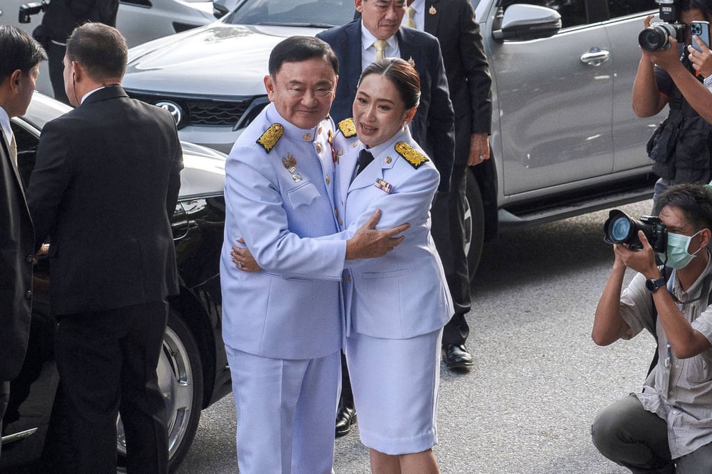 Thai PM Paetongtarn Shinawatra (right) and her father, former PM Thaksin in Bangkok in 2024. Photo: AFP