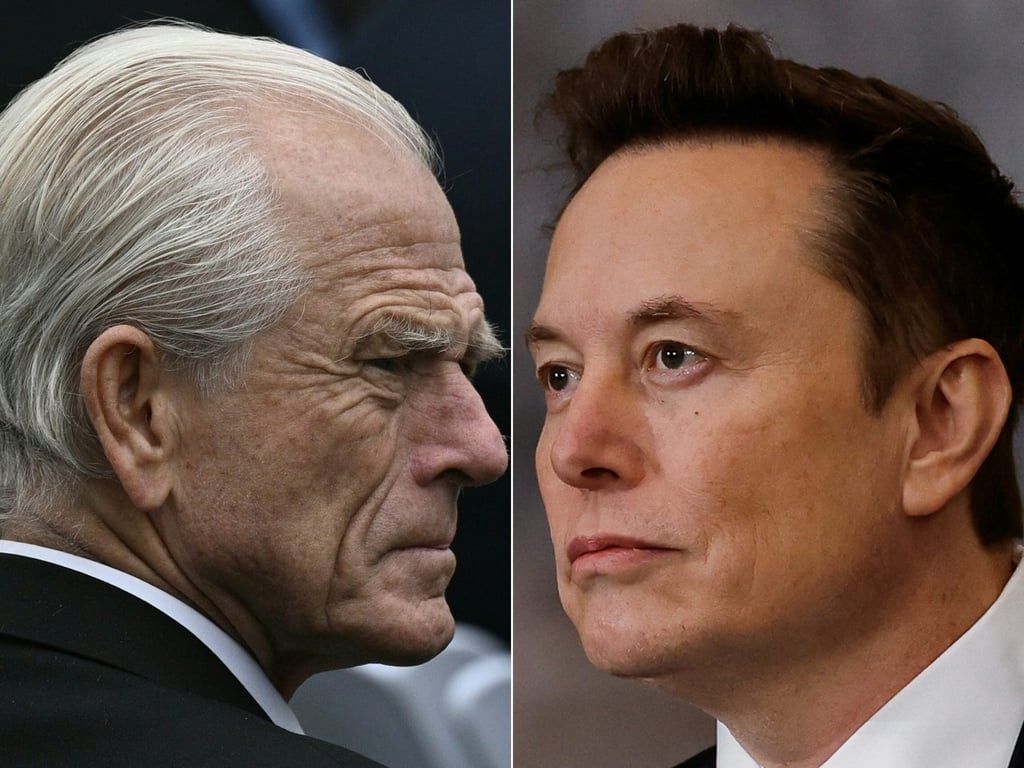 Senior US presidential adviser Peter Navarro (left) and Tesla and SpaceX CEO Elon Musk. Photo: AFP