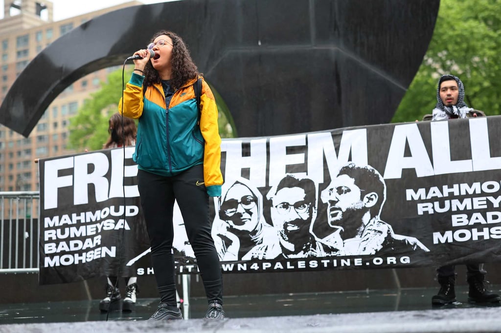 People gather for a rally in support of Tufts University student Rumeysa Ozturk and Columbia University student activist Mohsen Mahdawi in New York on Tuesday. Photo: AFP