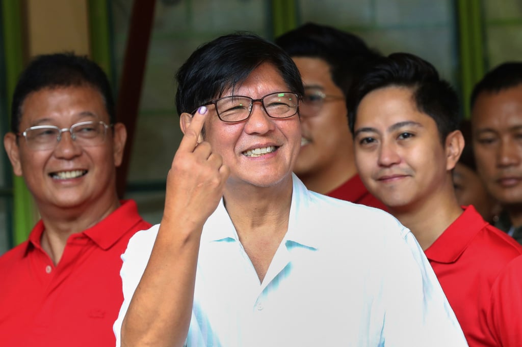 Philippine President Ferdinand Marcos Jnr shows the indelible ink on his finger after casting his ballot at a polling station in Batac City, Ilocos Norte province, on Monday. Photo: Presidential Communications Office via AP