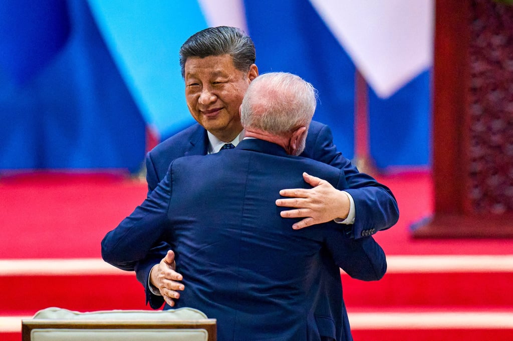 Chinese President Xi Jinping hugs Brazilian President Luiz Inacio Lula da Silva after delivering his opening speech at the fourth ministerial meeting of the Forum of China and Community of Latin American and Caribbean States in Beijing on Tuesday. Photo: AP