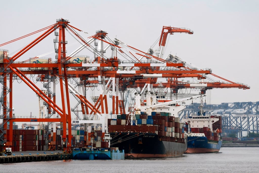 Container ships are loaded at a port in Tokyo, Japan, on Monday. Japan is South Korea’s fourth-largest trading partner. Photo: EPA-EFE