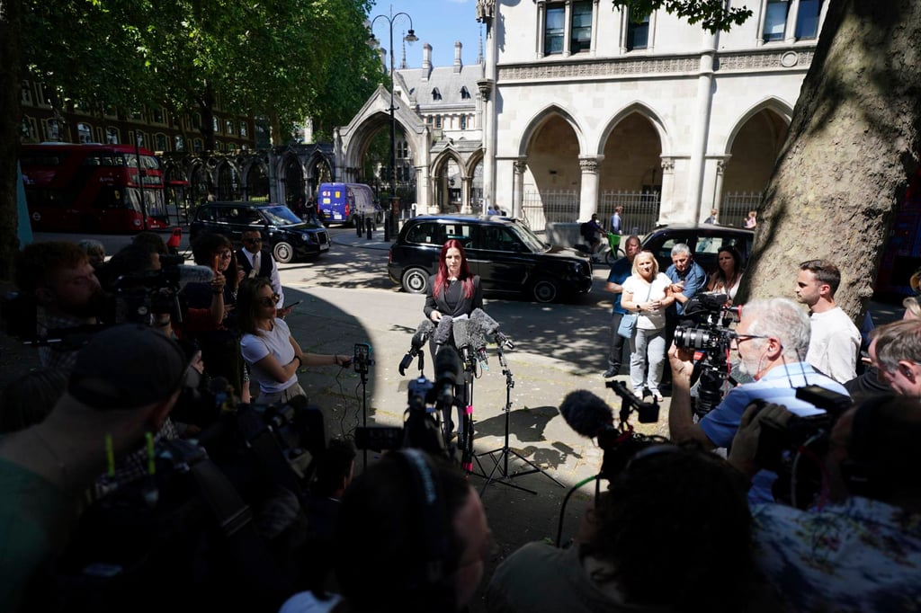 Lawyer Sarah Myatt speaks to the media outside the Royal Courts of Justice in London on Tuesday. Photo: PA via AP