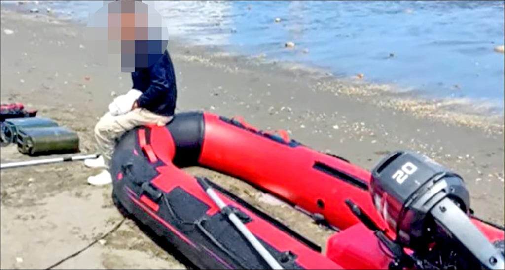 A father and son from mainland China crossed the Taiwan Strait using an inflatable boat. Photo: Handout