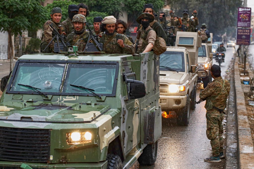 Syrian security forces deploy in a town south of Damascus after clashes with Druze fighters in April. Photo: AP