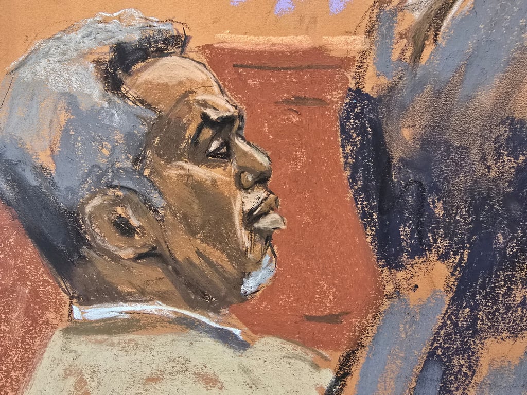 Sean “Diddy” Combs listens during his sex trafficking trial in New York on Thursday. Courtroom sketch: Jane Rosenberg via Reuters