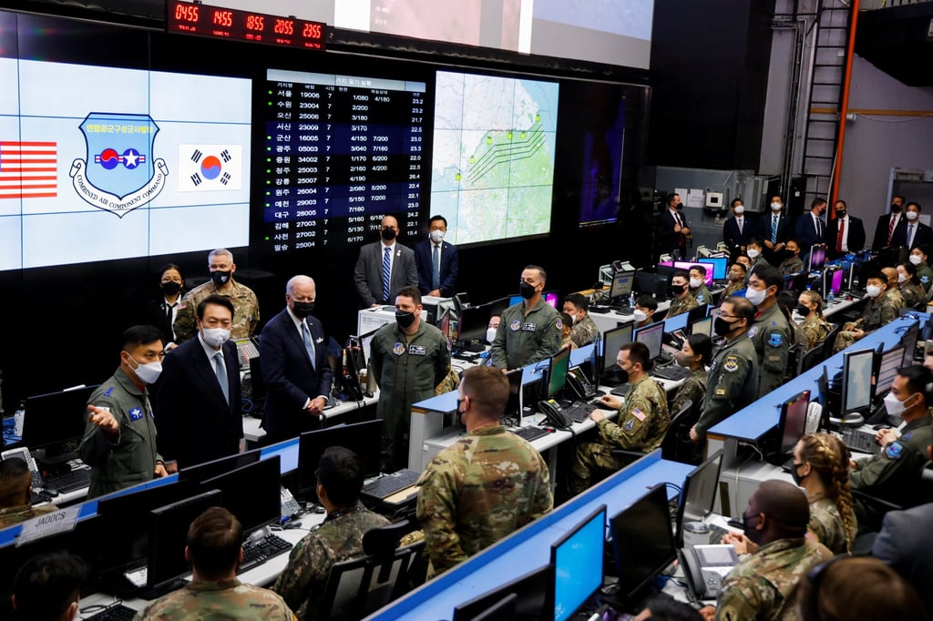 Then-US President Joe Biden and then-South Korean President Yoon Suk-yeol visit the Korea Air and Space Operations Centre at Osan Air Base in Pyeongtaek on May 22, 2022. Photo: Reuters