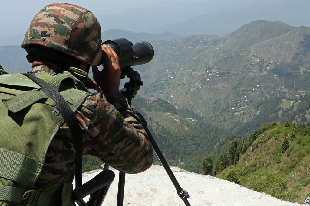 An Indian soldier keeps watch near the Line of Control separating Pakistan and India on Tuesday. Photo: AFP