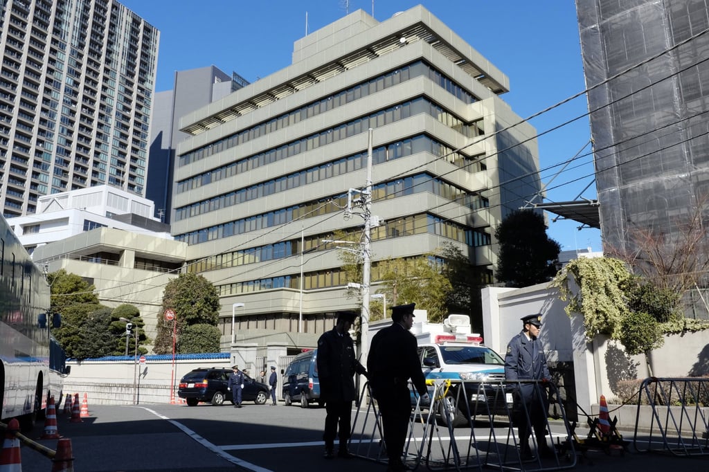 Policemen stand guard in front of the headquarters of the Chosen Soren, the pro-Pyongyang organisation representing North Korean residents of Japan, in Tokyo. Photo: AFP