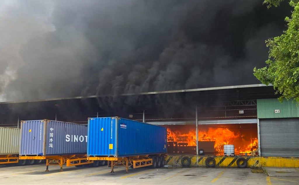 About 100 firefighters are currently trying to bring a No 3 alarm fire under control. Photo: Handout