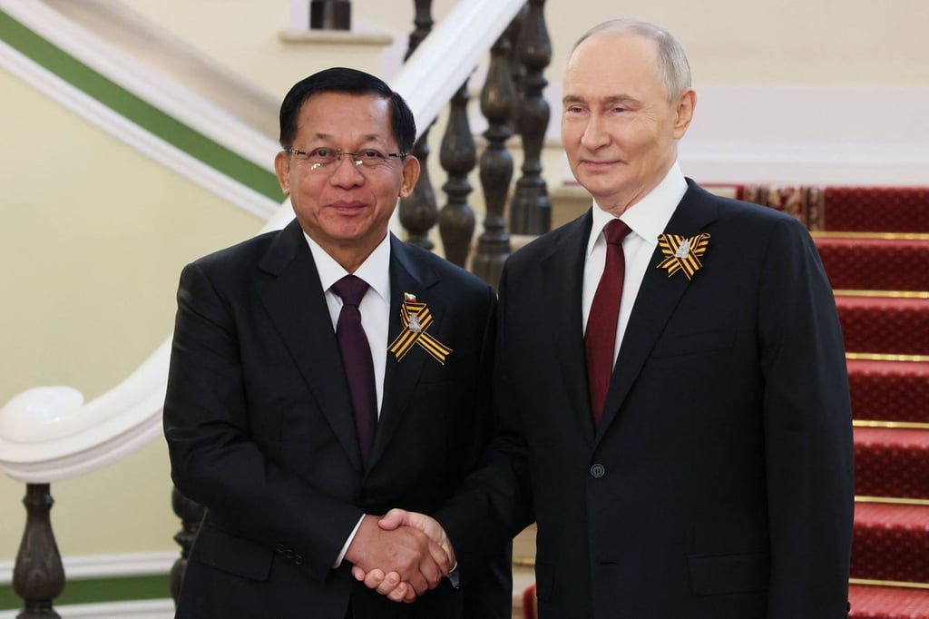 Russia’s President Vladimir Putin greets Myanmar junta leader Min Aung Hlaing before the Victory Day military parade in Moscow on May 9. Photo: Pool/AFP