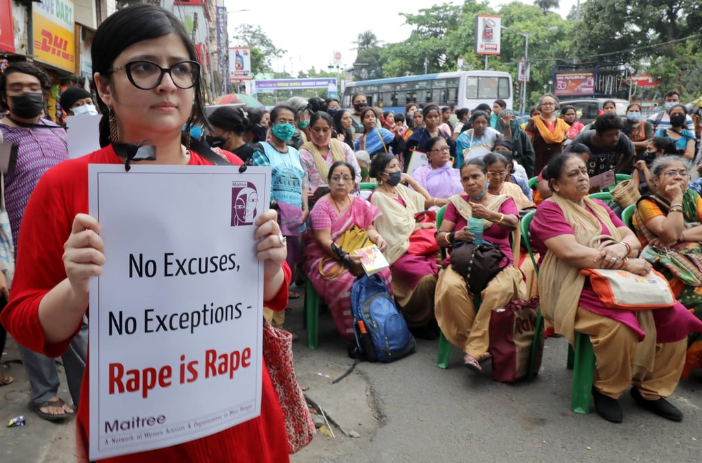 People attend a protest against violence against women, in Kolkata, India. Photo: EPA-EFE
