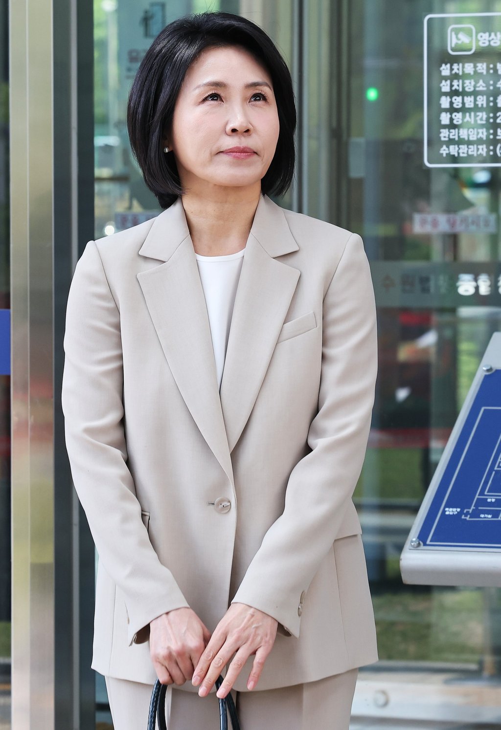 Kim Hye-kyung, wife of Democratic Party presidential candidate Lee Jae-myung, leaves the Suwon High Court on May 12 after it upheld a 1.5 million won fine for misusing a Gyeonggi government credit card in 2021 to support her husband’s campaign. Photo: EPA-EFE