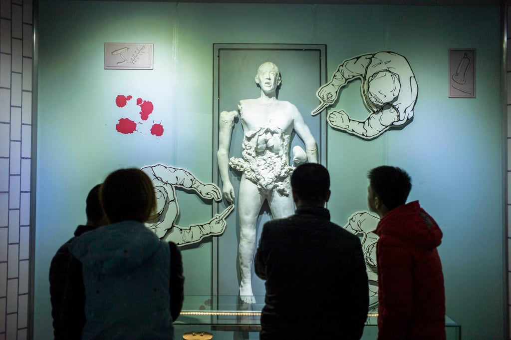 Visitors look at depiction of human experiments at the Unit 731 museum in Harbin, in northeast China’s Heilongjiang province. The facility was built to conduct research into germ warfare, weapons capabilities and the limits of the human body, rather than for mass extermination. Photo: AFP