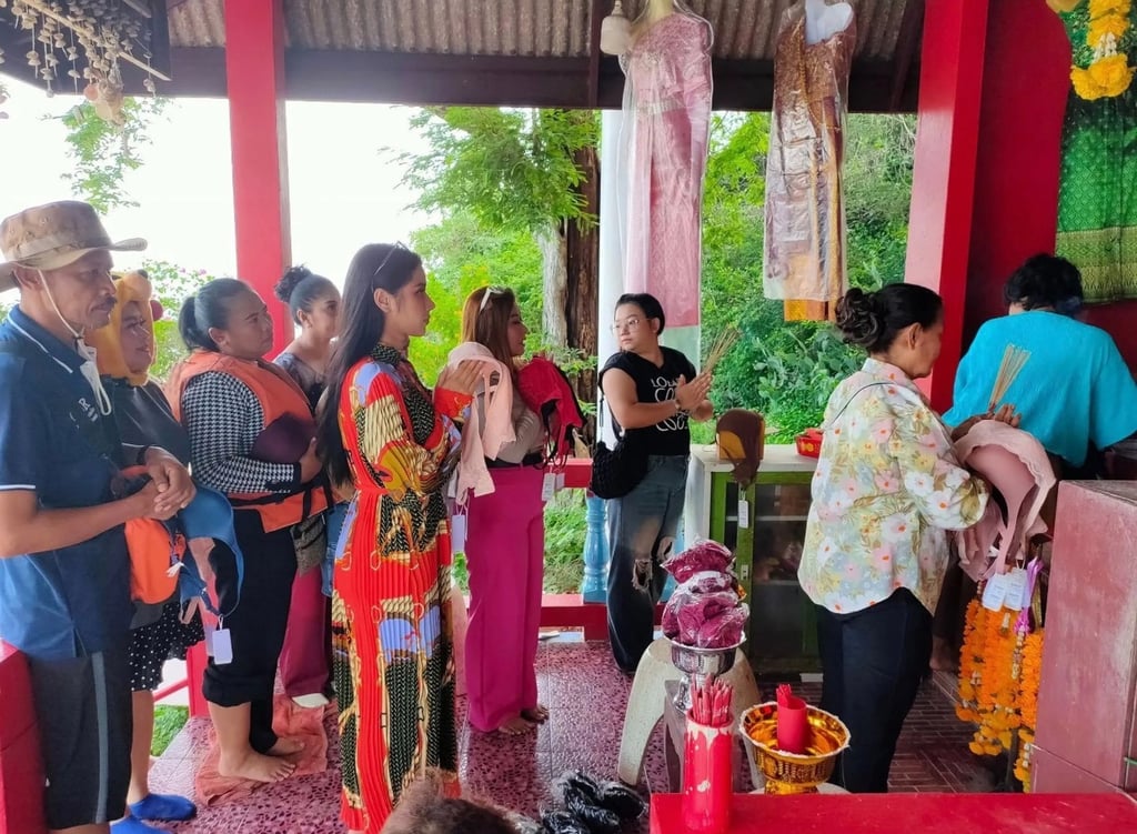 Devotees queue up at the island shrine, bras in hand, to offer thanks for their romantic wishes being granted. Photo: handout