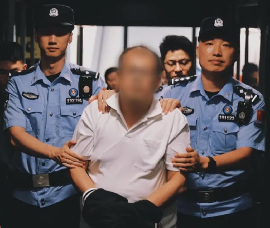 Tedy Teow being extradited to China on August 20 last year. Photo: Ministry of Public Security