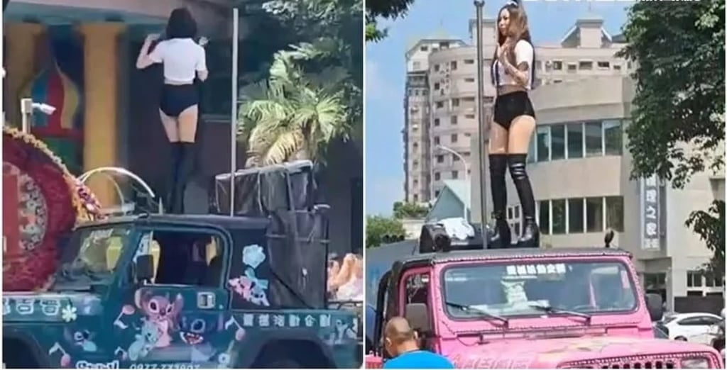 The dancers climbed atop the roofs of two SUVs, where poles were set up, and continued their performance from that elevated position. Photo: SET News