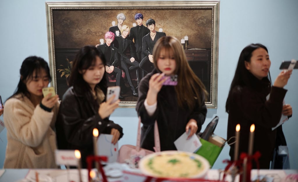 Fans of virtual K-pop boy band Plave look around a pop-up store in Seoul, South Korea, on March 7. Photo: Reuters