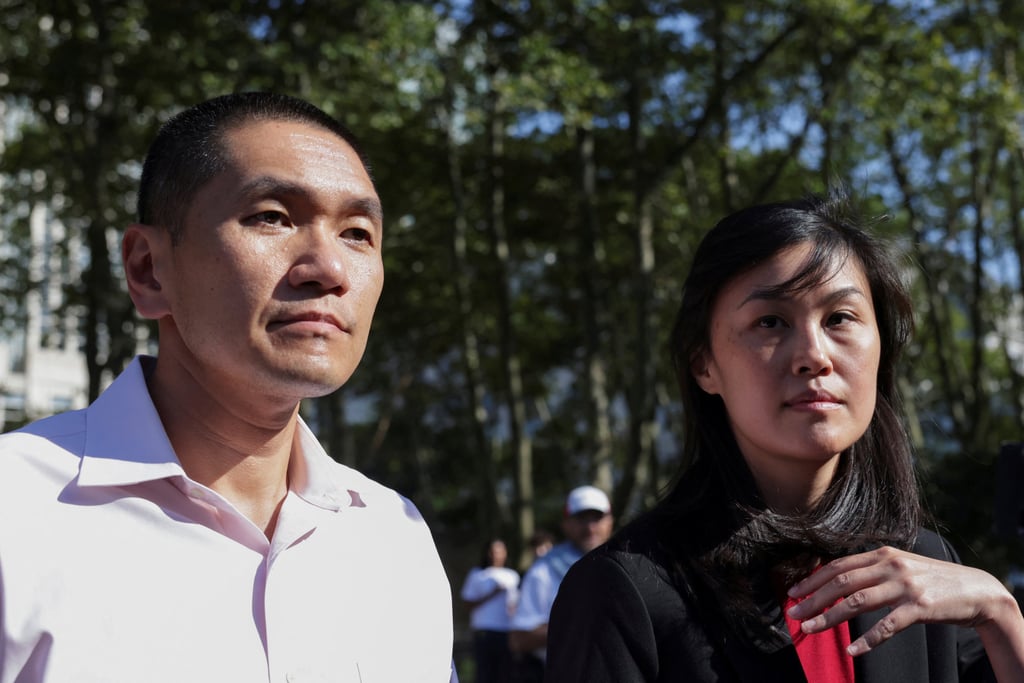 Sun accompanied by her husband, Chris Hu, who also faces US federal charges. Photo: Reuters
