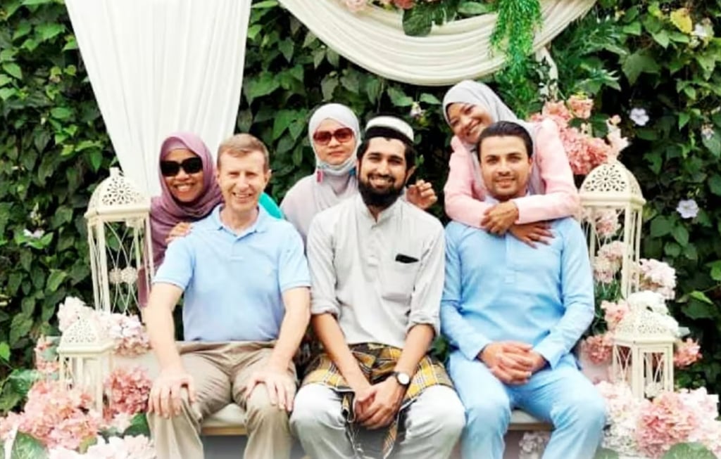 The trio of husbands from Britain, Pakistan and Egypt with their Malaysian wives. Photo: handout
