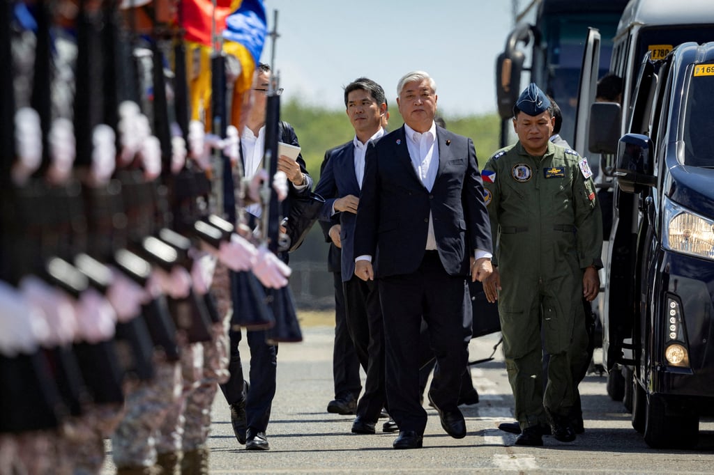 Japanese Defence Minister Gen Nakatani (centre) at Naval Station Ernesto Ogbinar in San Fernando City, the Philippines, in February. Photo: Reuters