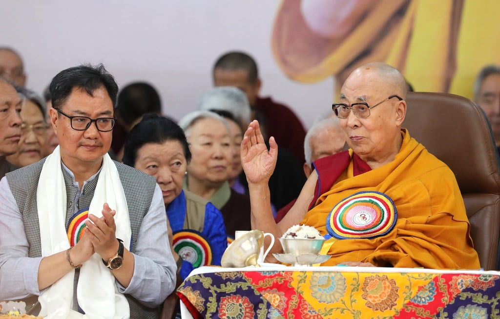 Senior Indian minister Kiren Rijiju attends the 90th birthday celebrations for the Dalai Lama at the Tsuglagkhang Tibetan temple complex near Dharamsala, India, on Sunday. Photo: EPA