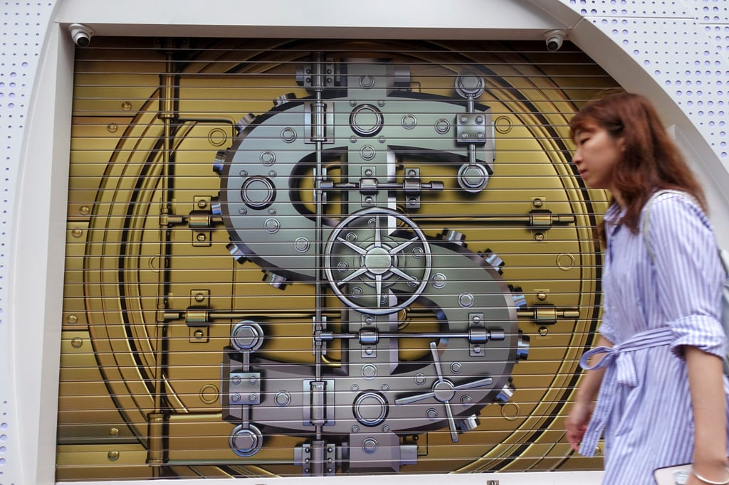 A currency exchange in Causeway Bay with a bank vault painted on its gate on May 5, 2024. Photo: Jelly Tse.