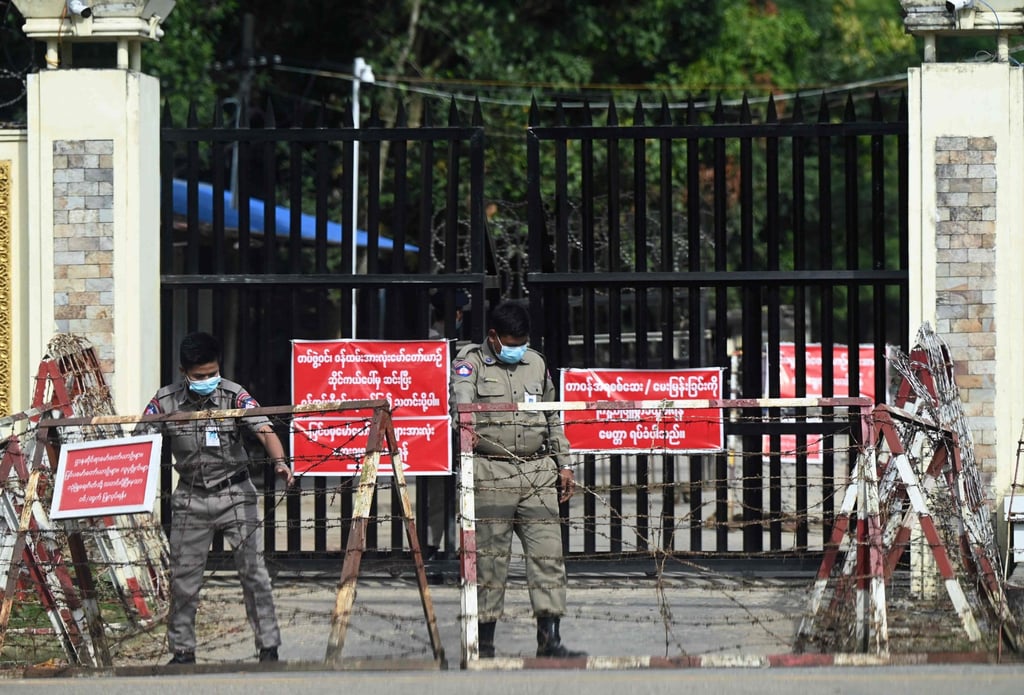 Prison security officials outside Insein Prison in Yangon. Photo: AFP