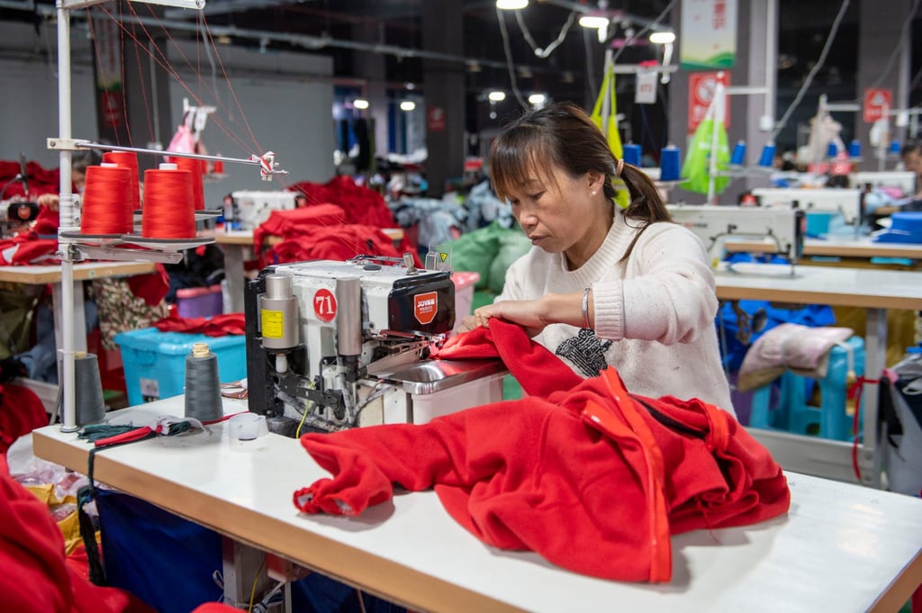 Workers make garments at a workshop in Qiandongnan, southwest China’s Guizhou province. China’s garment industry is rapidly losing market share in the United States amid the trade war. Photo: Getty Images