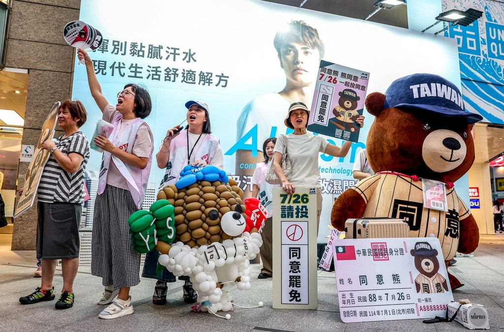 Supporters of the recall campaign gather on Tuesday outside a Taipei metro station shouting “Great recall, great success”. Photo: AFP