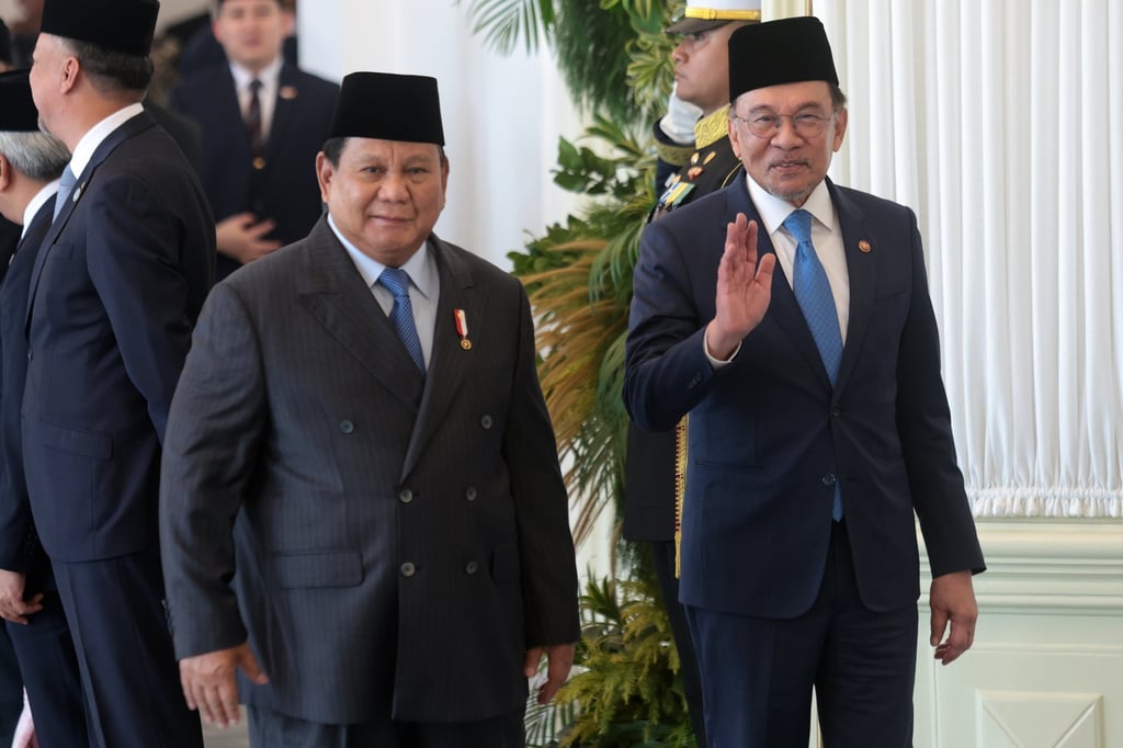 Malaysia’s Prime Minister Anwar Ibrahim (right) with Indonesian President Prabowo Subianto at the Presidential Palace in Jakarta on Monday. Photo: EPA
