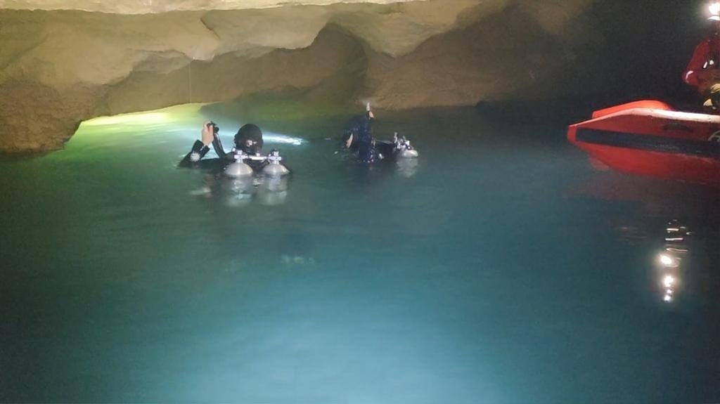 Two specialist rescue divers were at the mouth of the cave in which Wang was trapped for five days. Photo: Handout