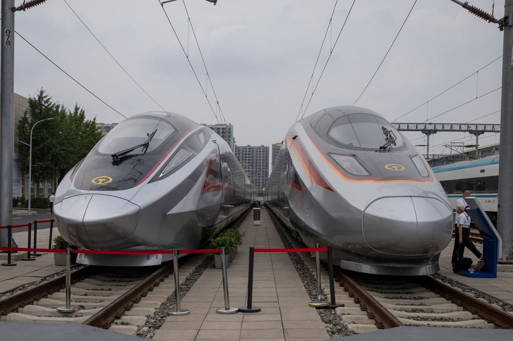 China’s CR450AF EMU (left) and CR400AF-S EMU trains are displayed at the 12th UIC High-Speed Railway Congress at the National Railway Test Centre in Beijing on July 9. Photo: EPA
