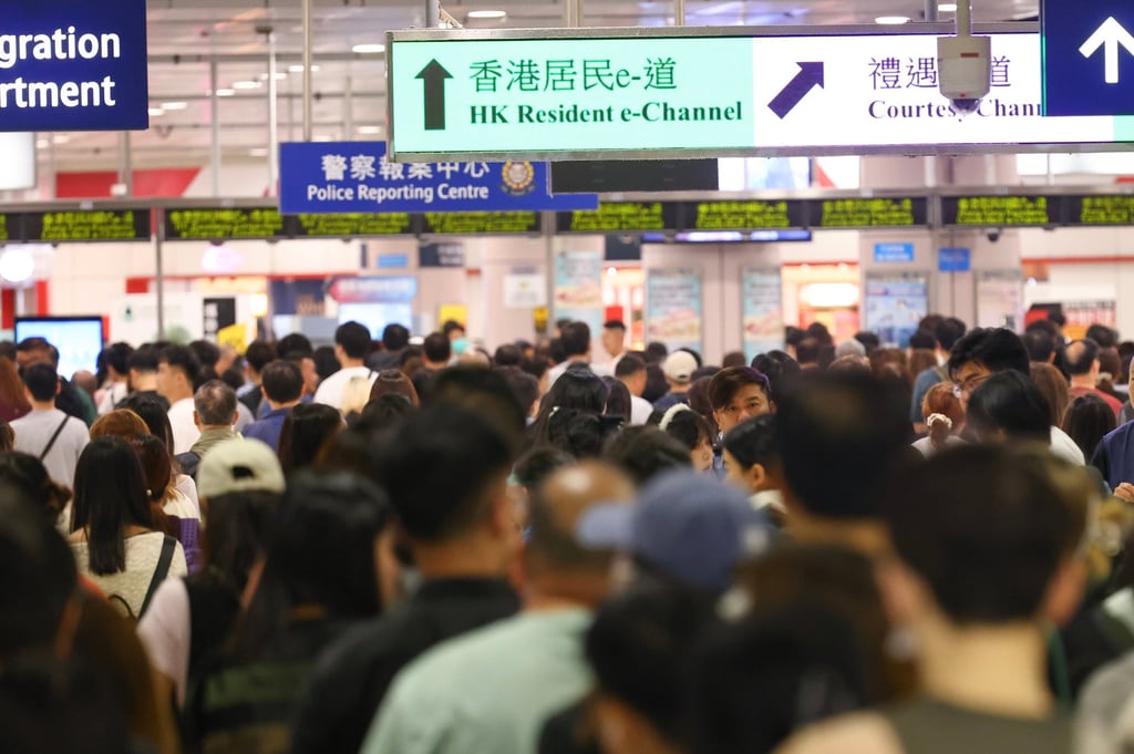 People head into Shenzhen via the Lok Ma Chau border crossing point on April 12. Photo: Dickson Lee