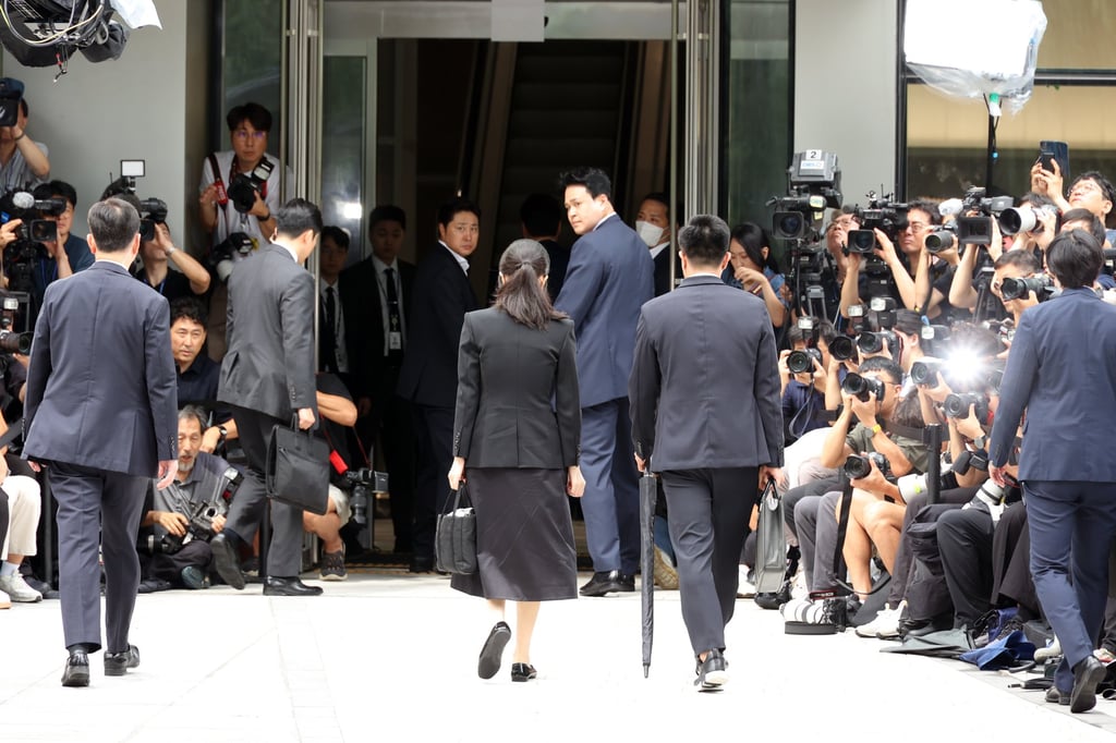 Kim Keon-hee (centre) enters the special prosecutor’s office in Seoul on Wednesday. Photo: Yonhap/EPA