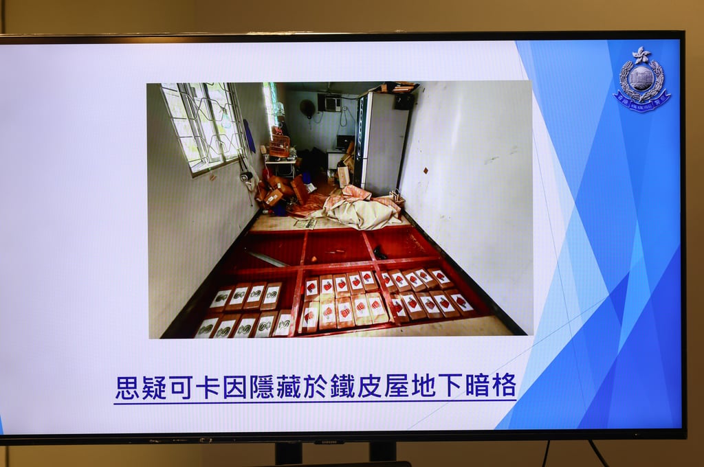 A total of 29 1kg blocks of suspected cocaine were found hidden under the floorboards in a corrugated iron shed in Yuen Long. Photo: Dickson Lee