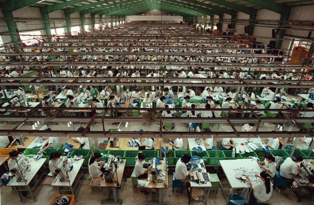 Workers stitch shoes at a Korean-owned factory in Ho Chi Minh City in 1997. South Korean companies have invested an estimated US$92.5 billion in Vietnam over the years. Photo: AP
