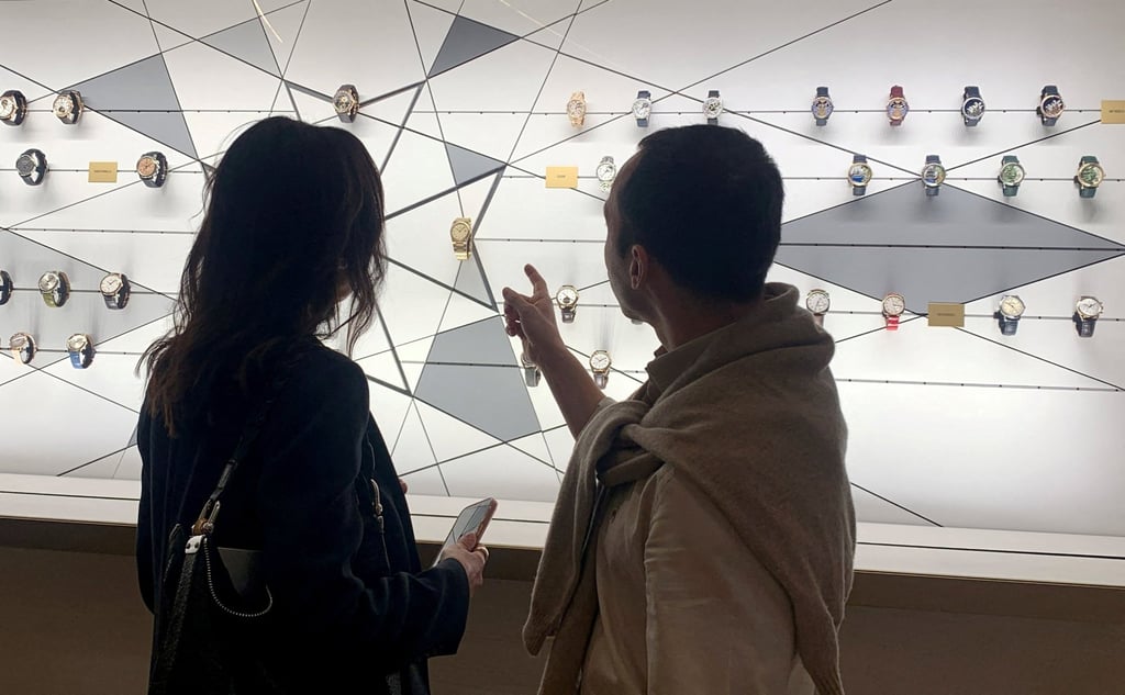 Visitors look at Vacheron Constantin watches at a trade fair in Switzerland in April. Photo: Reuters