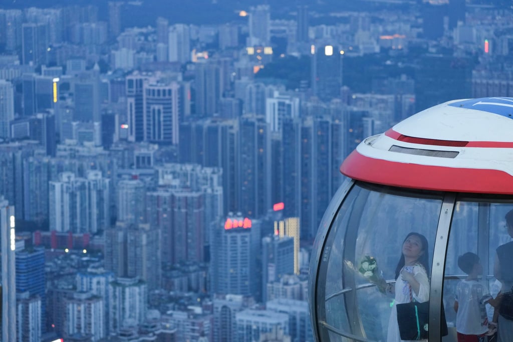 Visitors at Canton Tower in Guangzhou, southern China. Photo: Eugene Lee
