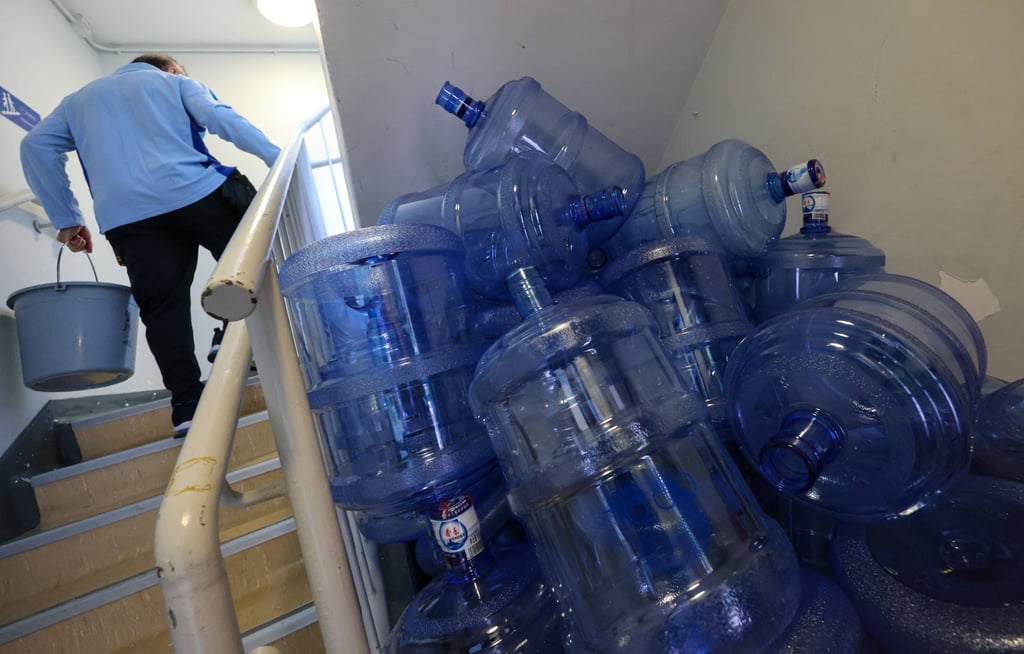 Used water bottles marked “XinLe” at the Hong Kong Squash Centre. Photo: Jelly Tse