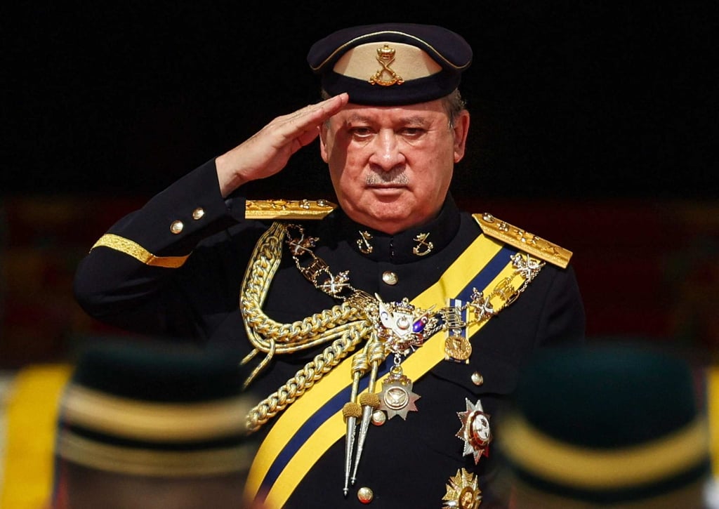 Malaysia’s King Sultan Ibrahim salutes a guard of honour in Kuala Lumpur last year. Photo: AFP